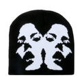 Detailed view of black knitted beanie featuring white jacquard abstract face pattern - M (56-58cm) / Black & White