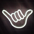 White Shaka hand gesture LED neon sign hanging on a grid wall for room decor - 1-2W / Shaka Hand White