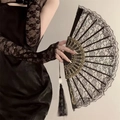 Elegant black lace folding fan with gold floral patterns and matching tassel detail - Lace Folding Fan Black With Pendant (No Feather)