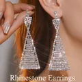 Close-up of dangling rhinestone geometric earrings with multi-layered triangle design - Large Triangle Tassel Style (JXER209) / Silver