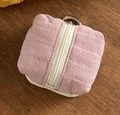 Pink quilted cotton electronics storage pouch for headphones with metal ring on wood - Flesh Pink