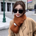 Knitted orange brown winter scarf for women featuring a woven label and ribbed finish - Yellow Coffee