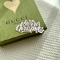 Close-up of Merry Christmas script on embossed green gift box over white texture - Gold / Regular Style B / Plus Thick Style