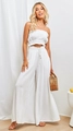 Detail of white two-piece strapless top and wide-leg trousers in breathable cotton linen - S / White