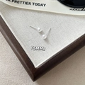 Detail shot of 5mm white round pearl earrings on a rustic wooden tray with linen - 5mm Pearl