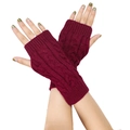 Close-up of cable-knit texture on wine red acrylic fingerless arm warmer gloves - One Size / Burgundy