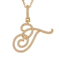 Macro shot of gold plated letter T pendant with shimmering white zircon micro inlay - T (Gold)