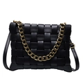 Black woven leather crossbody bag with bold gold chain and adjustable shoulder strap - Black