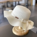 Girls' cream straw sun hat with wavy brim and bow decoration on a wooden stand - 52CM (2-5 Years Old) / White (Hat)