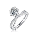 Detailed macro shot of the silver six-prong moissanite ring with side accent diamonds - R11567 Moissanite Style / 1 Carat / 6.5mm