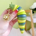 Portachiavi a lumaca giallo e verde con campanellino dorato e anello in metallo - Sfumatura Verde