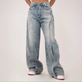Classic light blue washed wide-leg flared jeans with retro distressed cat-whisker details - S / Blue