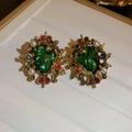 Close-up of vintage emerald green earrings with pearls and crown detail on white tray - 40# Gold Green Retro Round Plate (Silver Earring Post)