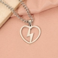 Detailed shot of silver stainless steel hollow heart necklace with lightning bolt pendant - Steel