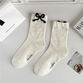 Beige crew socks with black bow detail and mesh knit texture in a minimalist style - One Size / 3D Bow / 3D Bowknot Cream White