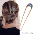 Golden U-shaped metal hair pin with iridescent shell inlay and model styling - U-Shaped: Gold with Iridescent Shell