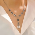 Detail of silver Y-shaped layered necklace with dark grey square gemstone pendants - Silver Y-Shaped Decorative Necklace (28)