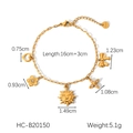 Detail of gold paperclip chain bracelet with heart, flower, and sun charms and dimensions - Gold (HC-B20150)