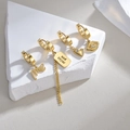 Set de cuatro pendientes de acero dorado con colgante cuadrado y corazón de cristal - Conjunto Asimétrico / Dorado