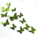 Close-up of green 3D mirror butterfly wall stickers in various sizes for home decor - Mirror Green 12pcs