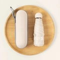 Beige mini vijf-voudige capsule paraplu met bijpassende antislip harde opbergkoffer - 6-Rib Mini Vinyl Verdikt + Capsulebox / Lichtbeige