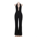 Macro detail of sexy black lace jumpsuit featuring halter neck and deep V-neck design - S / Black