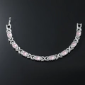 Silbernes Magnetarmband mit rosa Strasssteinen und XO-Gliedern im polierten Finish - Silber Rosa Strass Armband