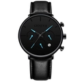 Detail of black leather watch strap and dial with date window and blue hands - Black Leather Strap / Blue Hands