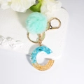 Letter C resin keychain with blue foil and gold glitter, mint green pompom accessory - Letter C