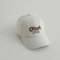 Detail view of cream baseball cap featuring brown 3D CHINA letter embroidery and stitching - 52-54cm (3-8 Years) / Off White