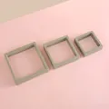 Three square PE film jewelry display boxes in olive green showing different size options - Green/11*11*2cm