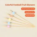 Bamboo fruit picks with colorful soccer ball decorations for parties and cocktails - 12cm / Colorful Soccer