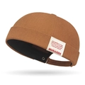 Bruine docker muts met katoenen twill textuur en decoratief geweven label aan de zijkant - Verstelbaar / koffiekleur