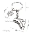 Silver metal ice skate and snowflake keychain pendant with detailed size specifications - Ice Skate (Silver)