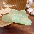 Light green iridescent cloud hair claw clip with pearlescent finish on a woven hat - 10.5cm / Green