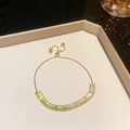 Adjustable gold plated bracelet with colorful rectangular cubic zirconia stones - Gold Light Green Zirconia Bracelet (A2130)