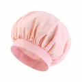 Detail of pink waterproof satin hair cap with elastic wide band for hair protection - One Size / Champagne