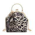 Leopard print shell handbag with golden ring handle and fluffy pompom keychain - Black