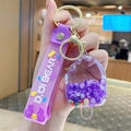 Portachiavi a ghiacciolo viola in acrilico con perline e cinturino in silicone - Stile Cordino / Viola