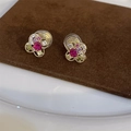 Floral gold stud earring featuring magenta stone and multicolor cubic zirconia accents - A9 Gold Multicolor Gem Flower Clip Earrings