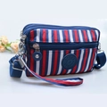 Mini crossbody phone bag with red white blue stripes and multiple zipper pockets - Blue with Red and White Stripes