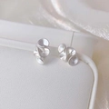 Elegant silver irregular petal earrings with textured metal finish on white silk - Matte Silver Irregular Stud Earrings