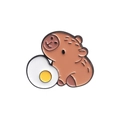 Cute capybara enamel pin holding a fried egg, stylish animal badge for clothing - Capybara Holding Fried Egg (QHXZ3151)