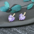 Elegant gold-tone heart stud earrings with purple faceted gems and clear accents - Purple