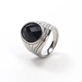 Detail of vintage steel ring featuring a faceted blue sandstone with textured metal band - Steel Blue Sandstone
