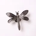Vintage dragonfly cabinet handle in antique silver finish with detailed wing textures - Concave Textured Dragonfly