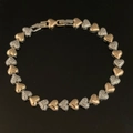 Two-tone gold and silver heart-link bracelet with textured details and fold-over clasp - SL290 Two-Tone Heart Bracelet