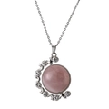 Detailed close-up of crescent moon pendant with pink crystal and zircon on silver chain - Pink/Metal Chain