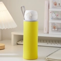 Portable yellow insulated water bottle with handle and safety lock on desk - Yellow