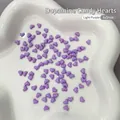 Macro detail of 4x5mm light purple resin candy heart charms for nail art decoration - 100 Pieces Set / Light Purple